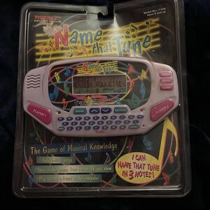 Tiger Electronics Name That Tune Handheld Console - Purple and Pink
